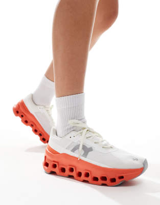 ON Cloudmonster running trainers in white and red