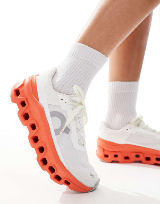 ON Cloudmonster running trainers in white and red, 3 of 5
