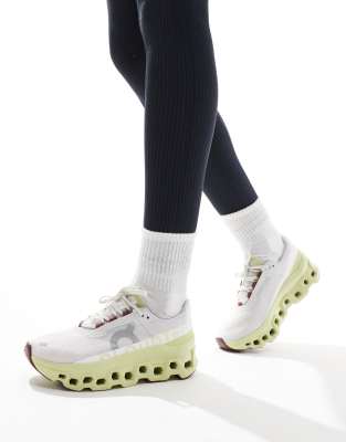 ON Cloudmonster running trainers in white and yellow