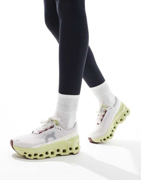 ON Cloudmonster running trainers in white and yellow - view 1