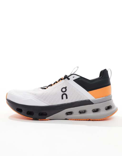 ON Cloudnova X training trainers in white and orange, 2 of 5