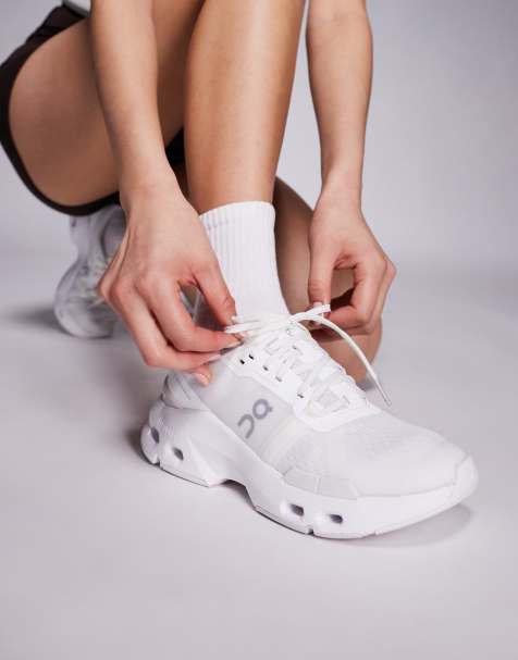 ON Cloudpulse training trainers in all white - view 1