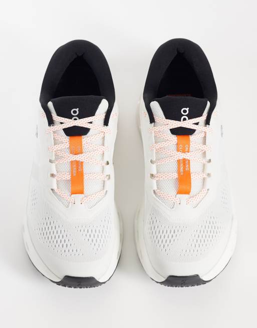 ON Cloudrunner 3 running trainers in white and orange, 3 of 5