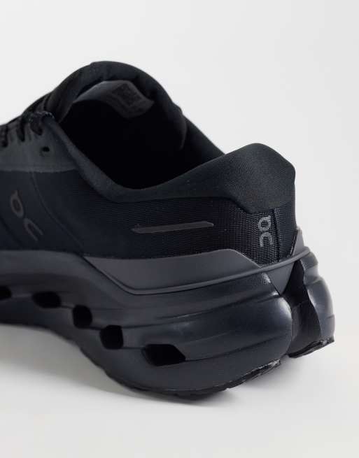 ON Cloudrunner 3 waterproof running trainers in black, 2 of 5