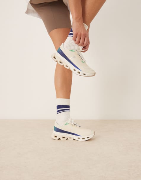 ON Cloudspark running trainers in cream and blue - view 1
