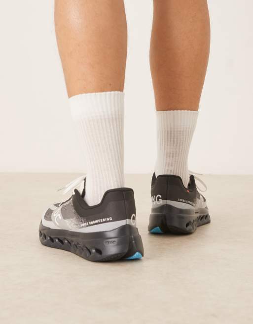 ON Cloudsurfer Next running trainers in black  , 4 of 5