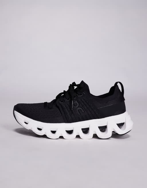 ON Cloudswift 4 running trainers in black and white, 2 of 5