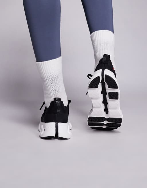 ON Cloudswift 4 running trainers in black and white, 3 of 5