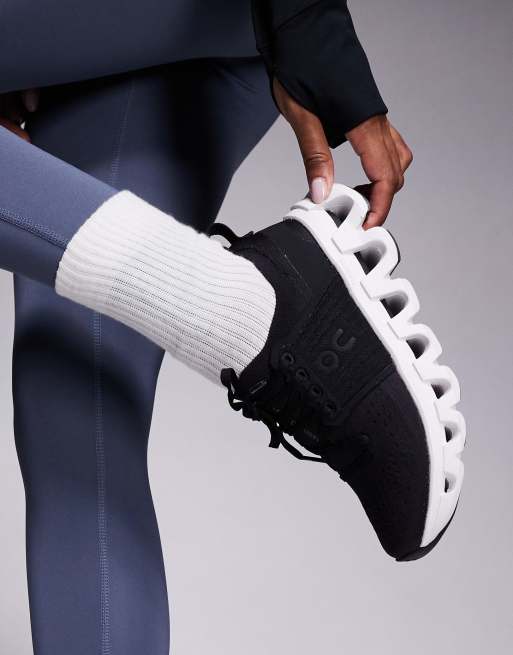 ON Cloudswift 4 running trainers in black and white, 4 of 5
