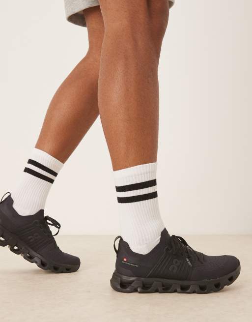 ON Cloudswift 4 running trainers in black, 3 of 5