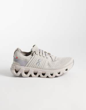 ON Cloudswift 4 running trainers in stone and grey