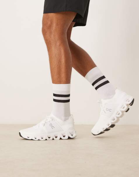 ON Cloudswift 4 running trainers in white - view 1