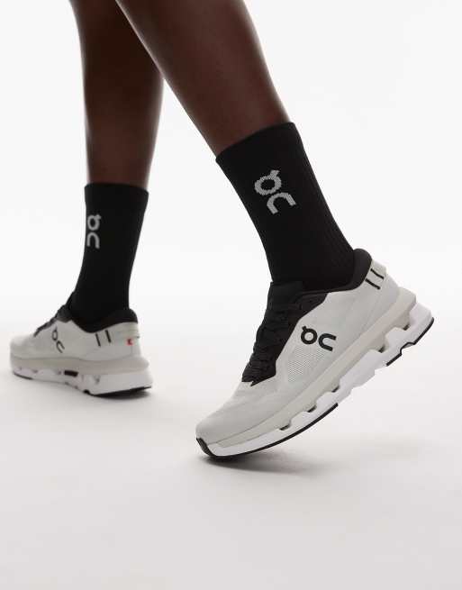 ON Cloudzone performance all day trainers in black and white