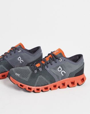 On Running Cloud X trainers in grey and rust