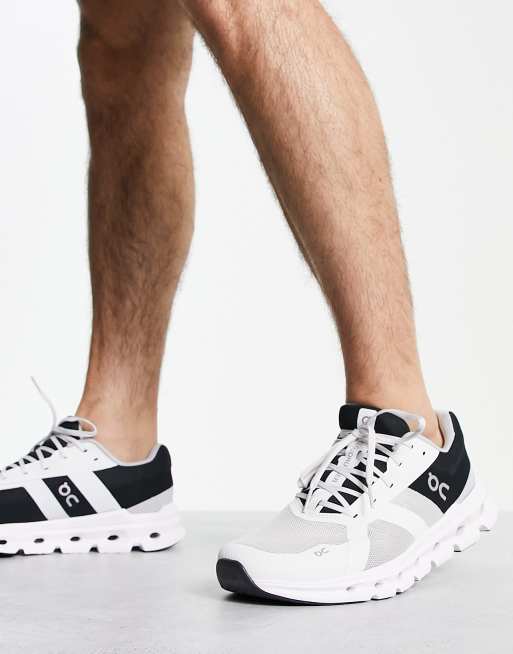 On Running - Cloudrunner - Sneakers in zwart en wit 