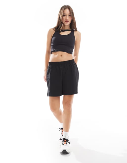 ON Studio cut-out gym top in black | ASOS