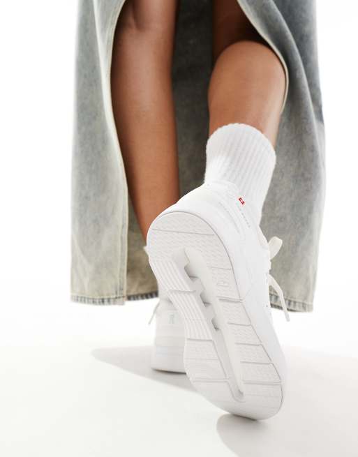 ON The Roger Advantage trainers in all white