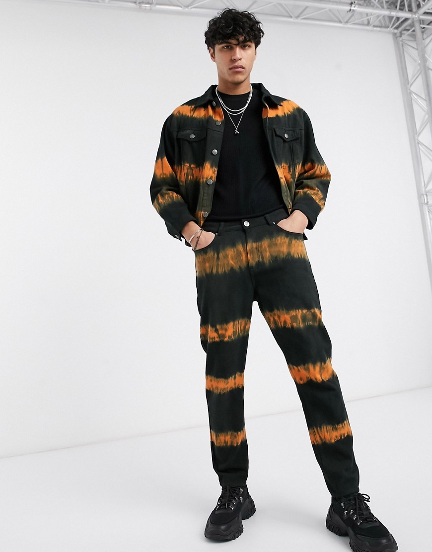 One Above Another – Slim jeans med svart och orange batikmönster