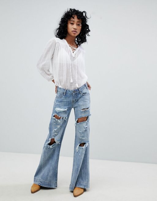 The Kript high waisted jeans with deconstructed waist detail