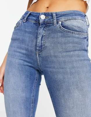 Only Blush mid waist flared jeans in medium blue