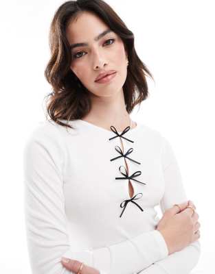 bow detail long sleeve top in white