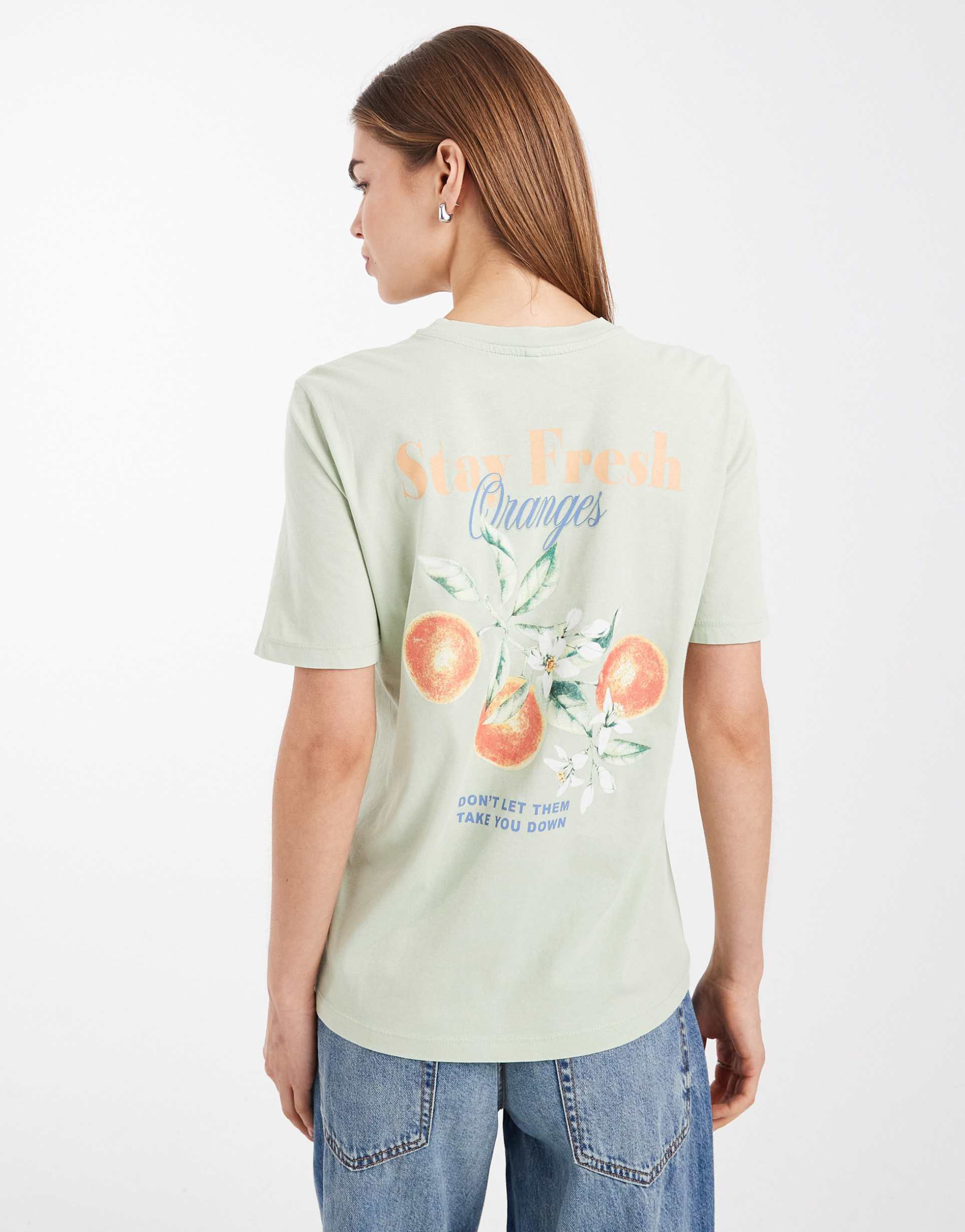 only boxy t-shirt in with orange back print in light green