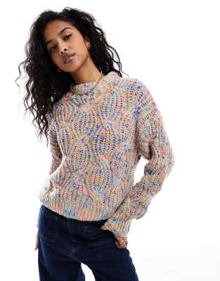 cable knit sweater in multi color yarn-pink