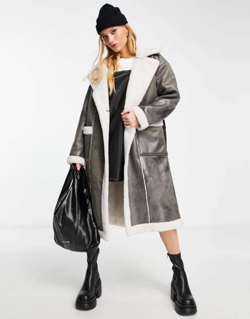 Only Cappotto in pelle sintetica marrone con dettagli in montone e cintura
