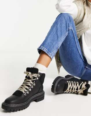 Only chunky lace up boot with faux fur trim in black