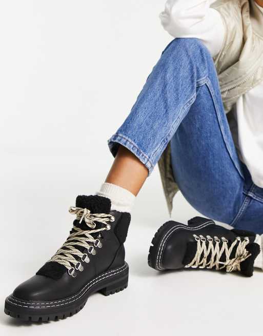 Lace up faux store fur boots