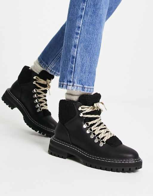 Black lace up store boots with fur