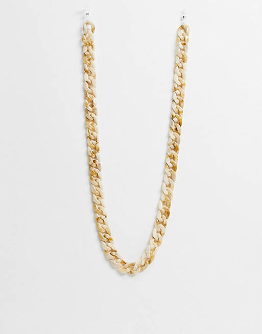 Only chunky sungalsses chain in neutral marble effect