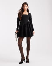 Kaiia exclusive double-layered slinky off-shoulder fluted drape sleeve mini dress in black