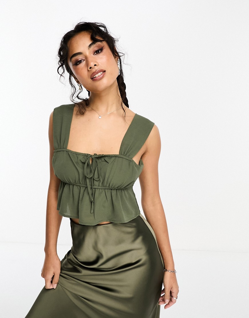 Only cropped peplum top with tie detail in khaki-Green