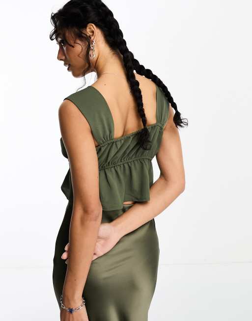 Only cropped peplum top with tie detail in khaki