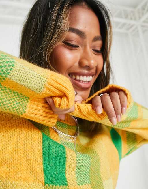 Green and 2025 yellow sweater