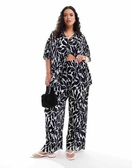 ONLY Curve - Broek met wijde pijpen in abstracte bloemenprint, deel van co-ord set  