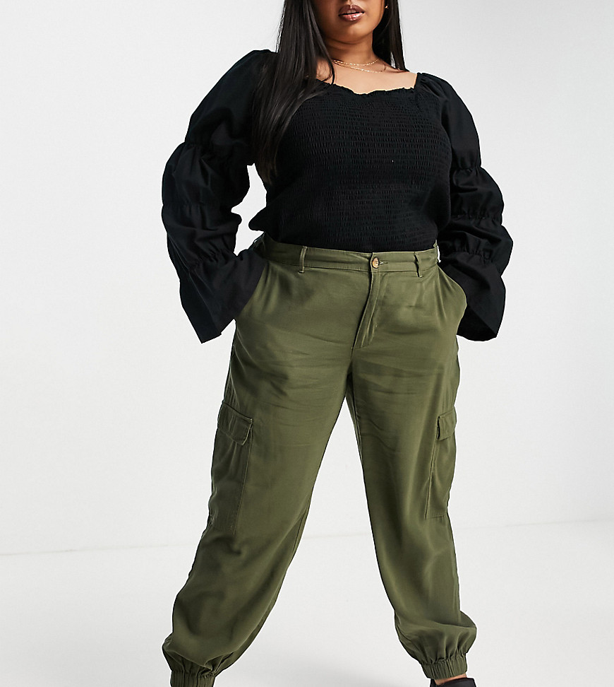 Plus-size trousers by Only Part of our responsible edit High rise Stretch-back waist Belt loops Side pockets Back pockets Cargo leg pockets Elasticated cuffs Regular, tapered fit Standard cut that narrows through the leg, regular on the waist