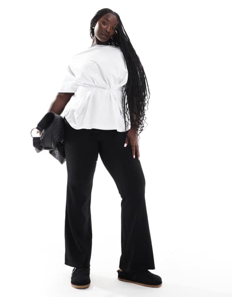 ONLY Curve high waist ribbed flared trousers in black - view 1