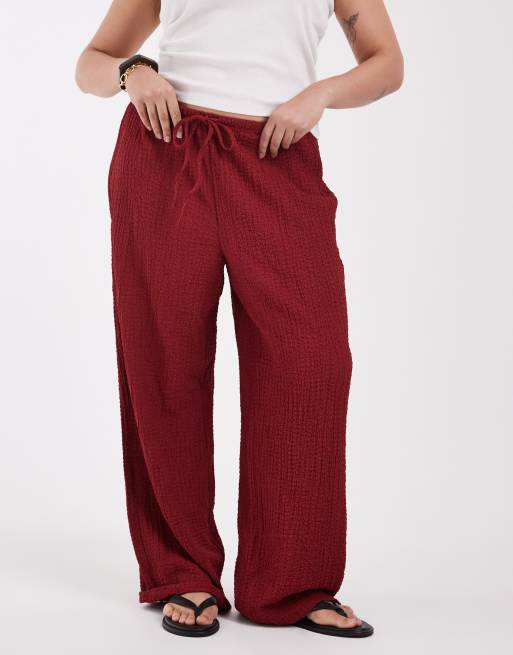 ONLY Curve high waist wide leg crinkled textured pants in dark red, 2 of 5