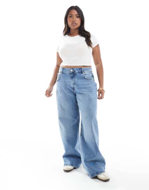 ONLY Curve Juicy wide leg jeans in mid blue