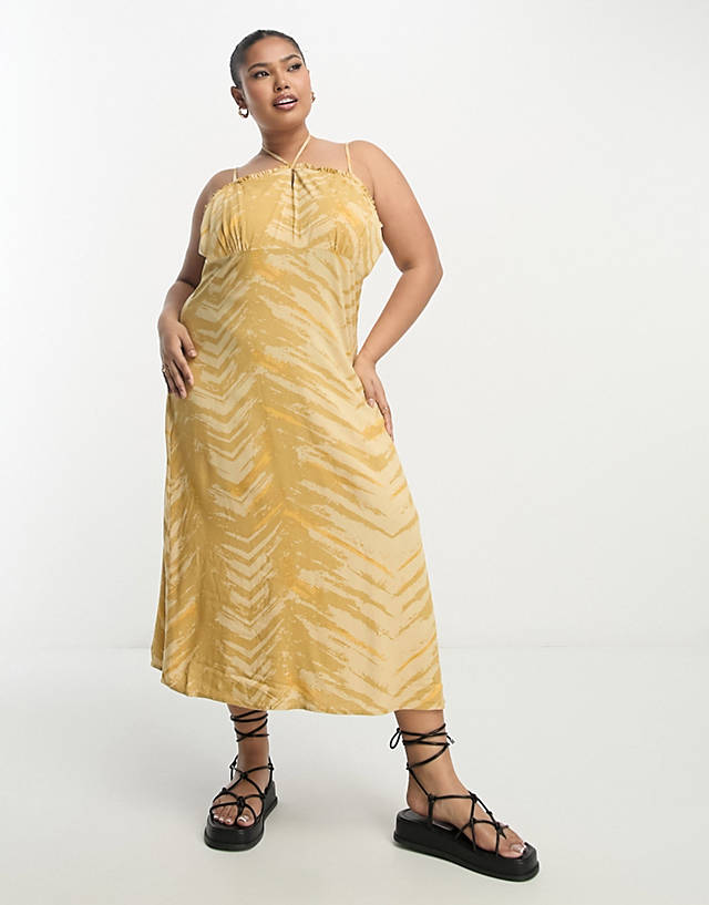 ONLY Curve - printed strappy midi dress in mustard