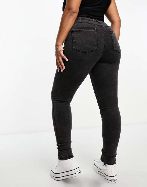 ONLY Curve skinny jeans in black acid wash