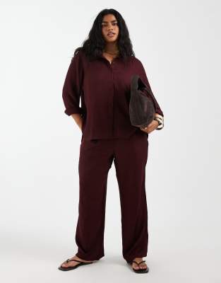 ONLY Curve textured wide leg trousers co-ord in burgundy