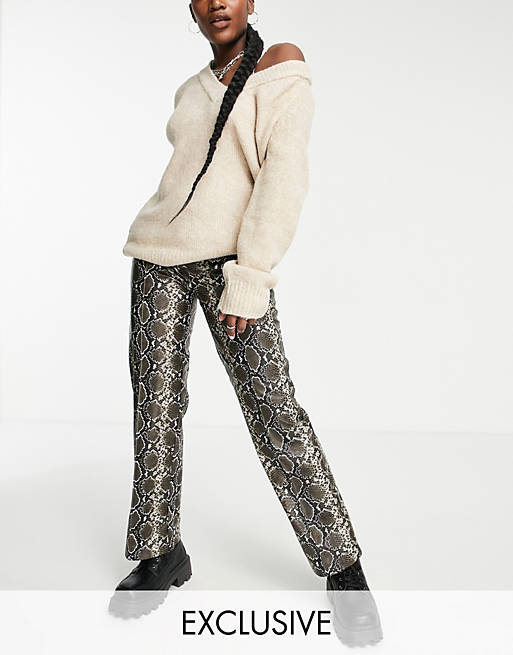 Only exclusive faux leather wide leg trousers in snake print