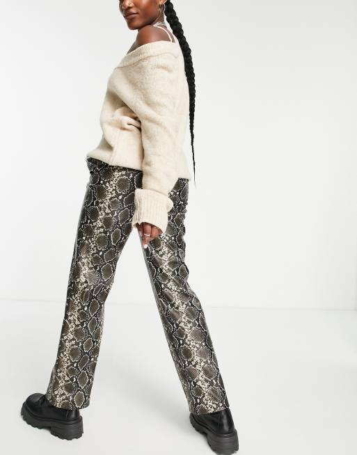 Only exclusive faux leather wide leg trousers in snake print