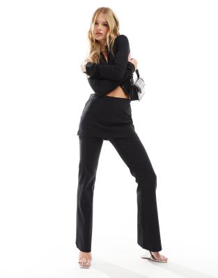 flared fit skirt over pants in black