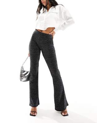 flared pants in black glitter