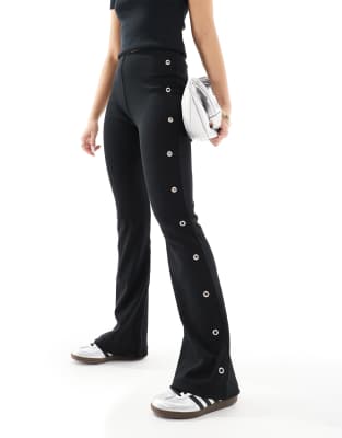 flared pants with eyelet detail in black