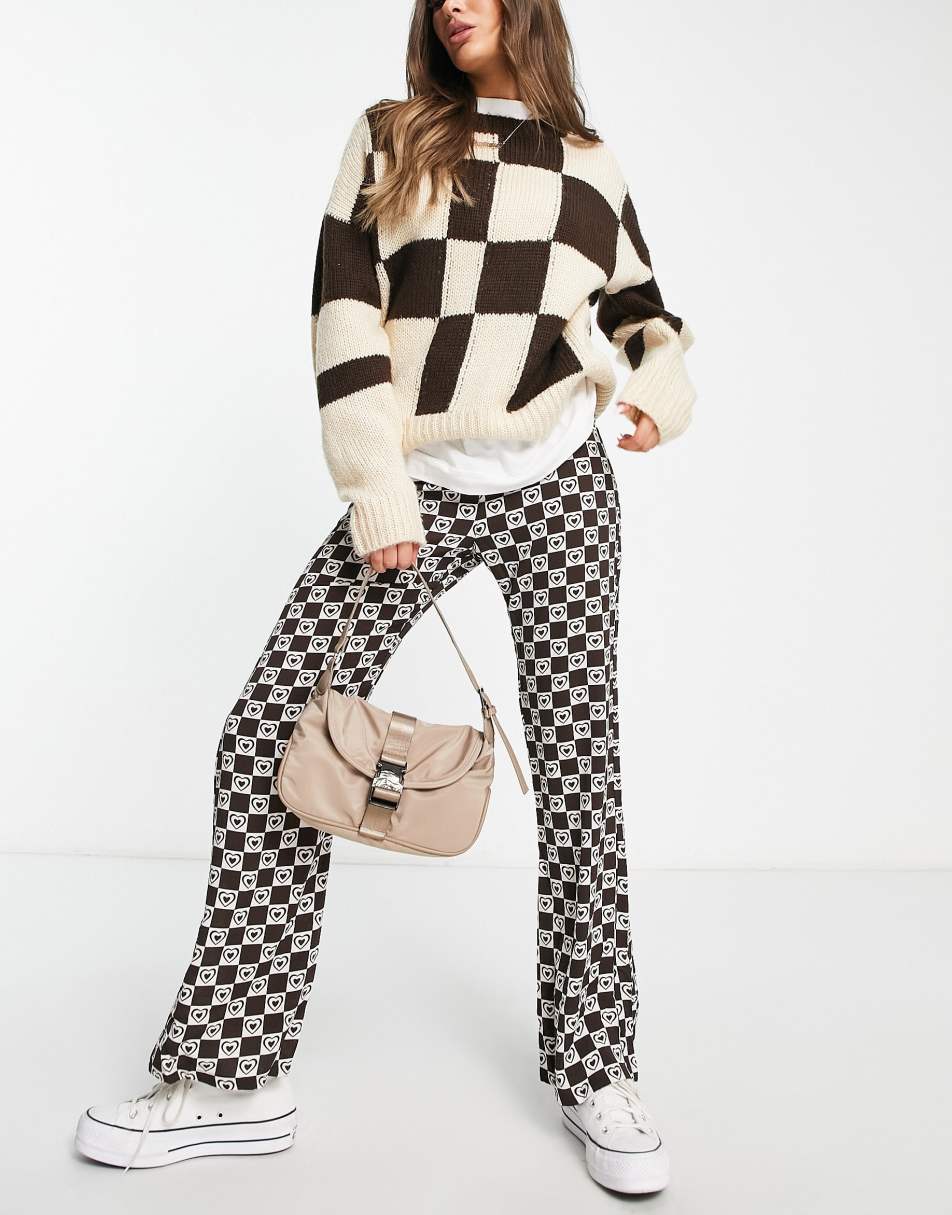 Only flared trousers in brown heart print